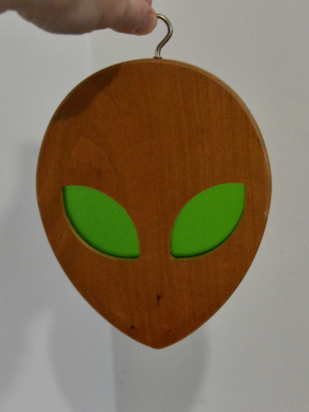 Hanging Handmade Solid Wood Alien Head Decor with Transparent Green Eyes